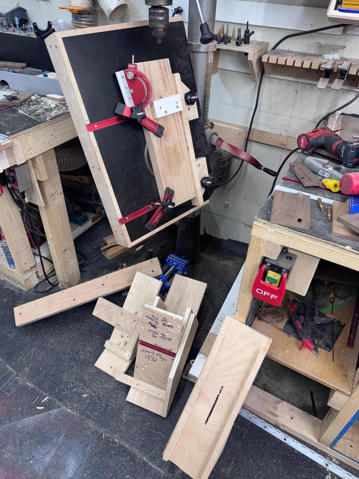 This is a quick shot of what went into making a few business card holders. The time and money spent just on materials for jigs was quite a bit. Not to mention a $3000 drill press and 10’s of thousands of dollars of other tools used